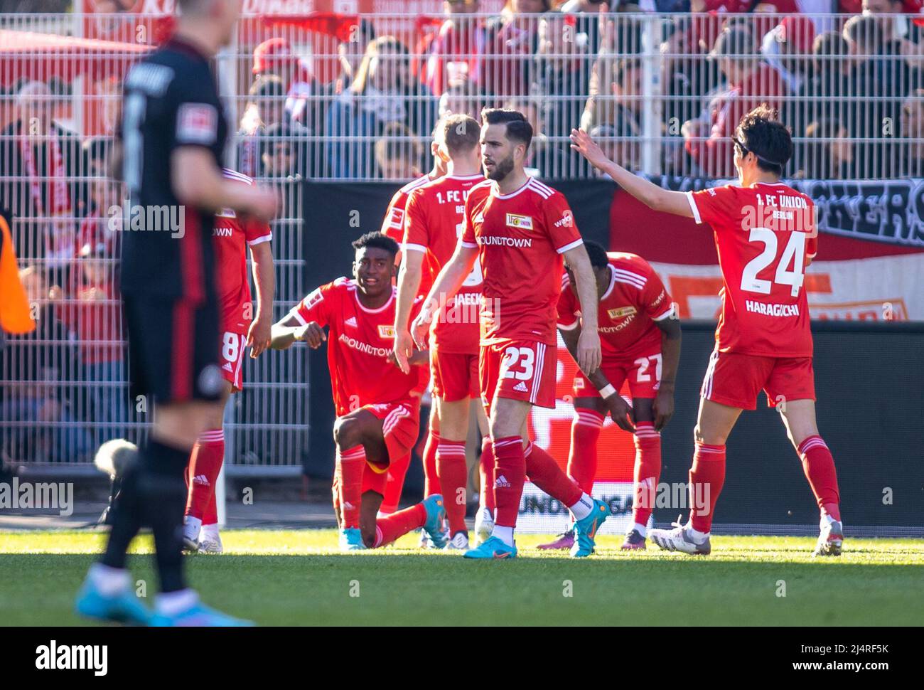 Berlin, Germany. 17th Apr, 2022. Soccer: Bundesliga, 1. FC Union Berlin - Eintracht Frankfurt, Matchday 30, An der Alten Försterei. Berlin's Taiwo Awoniyi (l) celebrates with teammates after scoring the 1:0 goal. Credit: Andreas Gora/dpa - IMPORTANT NOTE: In accordance with the requirements of the DFL Deutsche Fußball Liga and the DFB Deutscher Fußball-Bund, it is prohibited to use or have used photographs taken in the stadium and/or of the match in the form of sequence pictures and/or video-like photo series./dpa/Alamy Live News Stock Photo