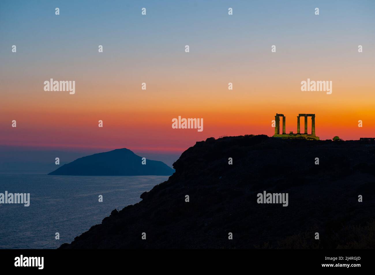 Sunset over the Temple of Poseidon at Cape Sounion, Greece Stock Photo ...