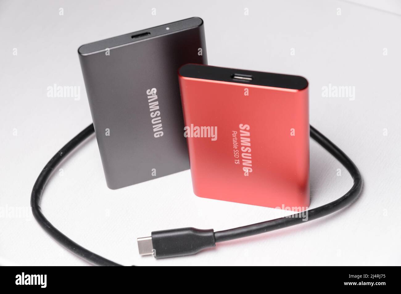 Close-up of Samsung portable SSD T5 and T7 flash storage with connected  USB-C cables on white background Stock Photo - Alamy