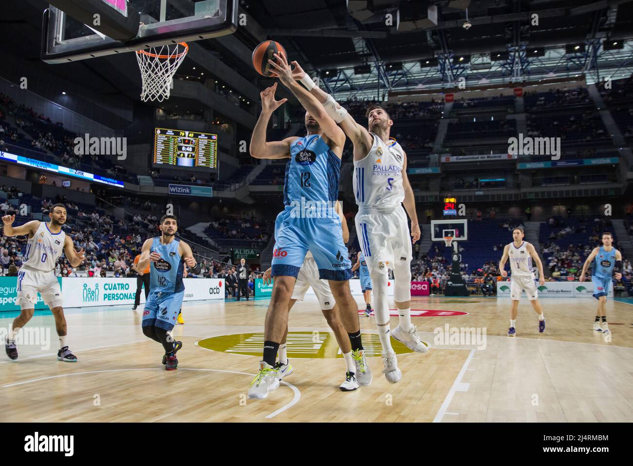 Madrid, Madrid, Spain. 17th Apr, 2022. Nikola Jankovic (blue) and Rudy FernÃndez (right white) during Real Madrid victory over BreogÃn Lugo 90 - 65 in Liga Endesa regular season game (day 29) celebrated in Madrid (Spain) at Wizink Center. April 17th 2022. (Credit Image: © Juan Carlos GarcÃ-A Mate/Pacific Press via ZUMA Press Wire) Stock Photo