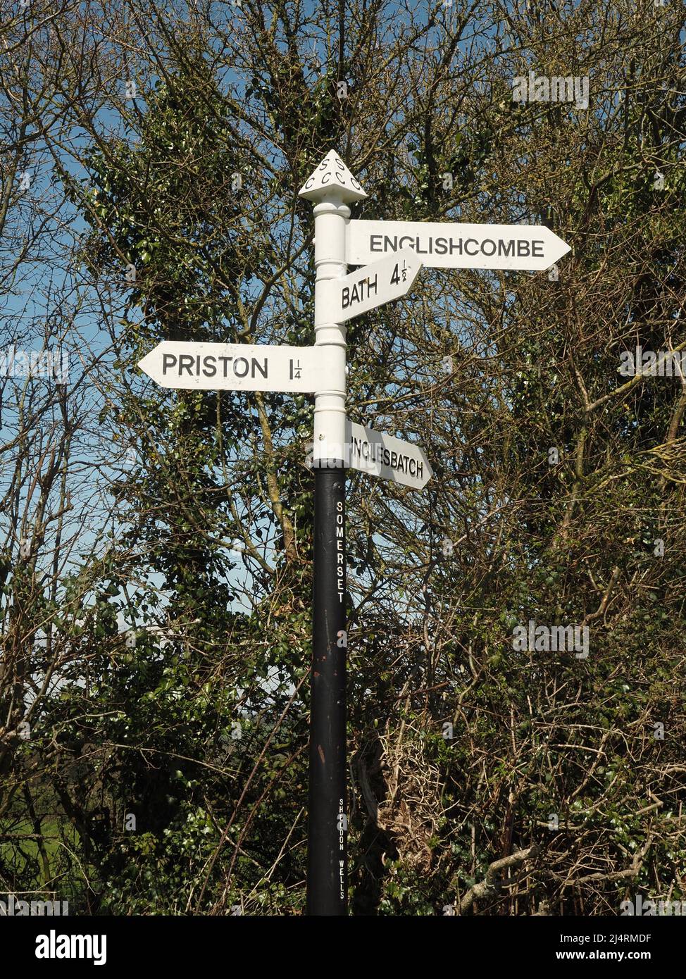Road signs at junction on country lanes in rural Somerset, south of Bath. Stock Photo