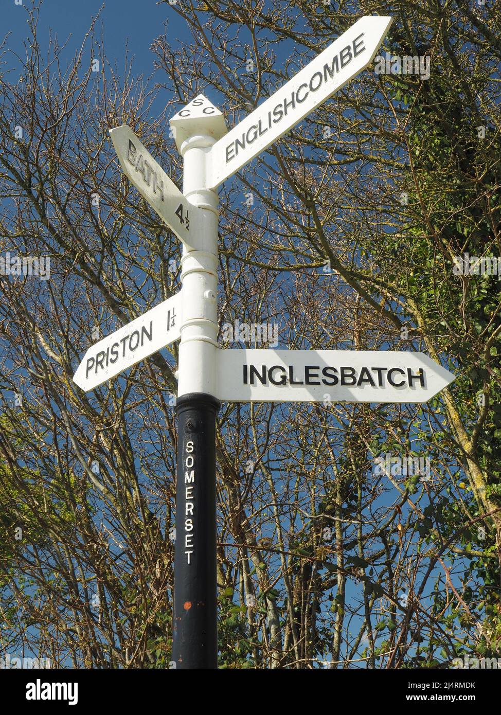 Road signs at junction on country lanes in rural Somerset, south of Bath. Stock Photo