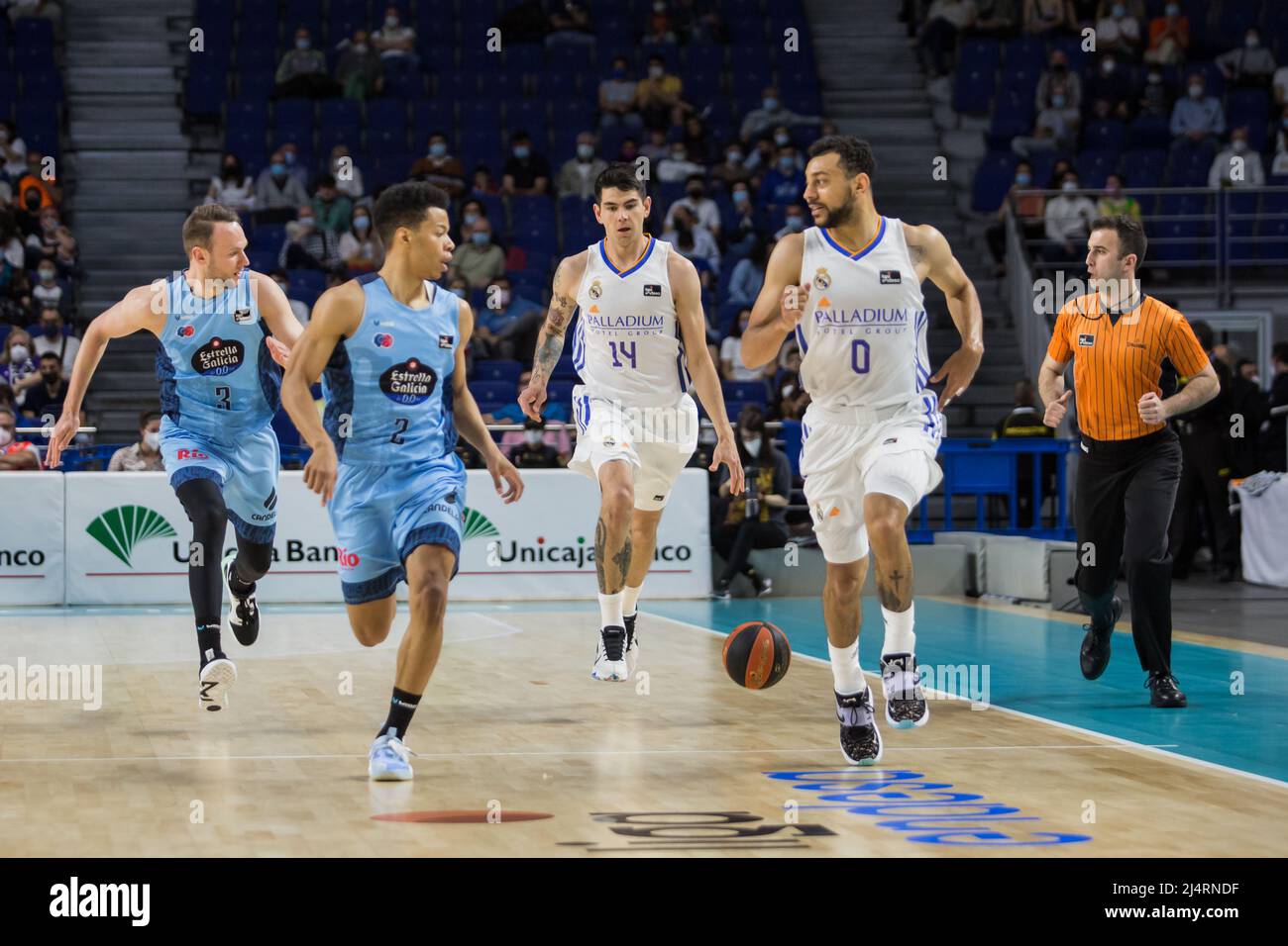 Madrid, Madrid, Spain. 17th Apr, 2022. Mindaugas Kacinas (L), Trae Bell-Haynes (left center), Gabriel Deck (right center) and Nigel Williams-Goss (R) during Real Madrid victory over BreogÃn Lugo 90 - 65 in Liga Endesa regular season game (day 29) celebrated in Madrid (Spain) at Wizink Center. April 17th 2022. (Credit Image: © Juan Carlos GarcÃ-A Mate/Pacific Press via ZUMA Press Wire) Stock Photo