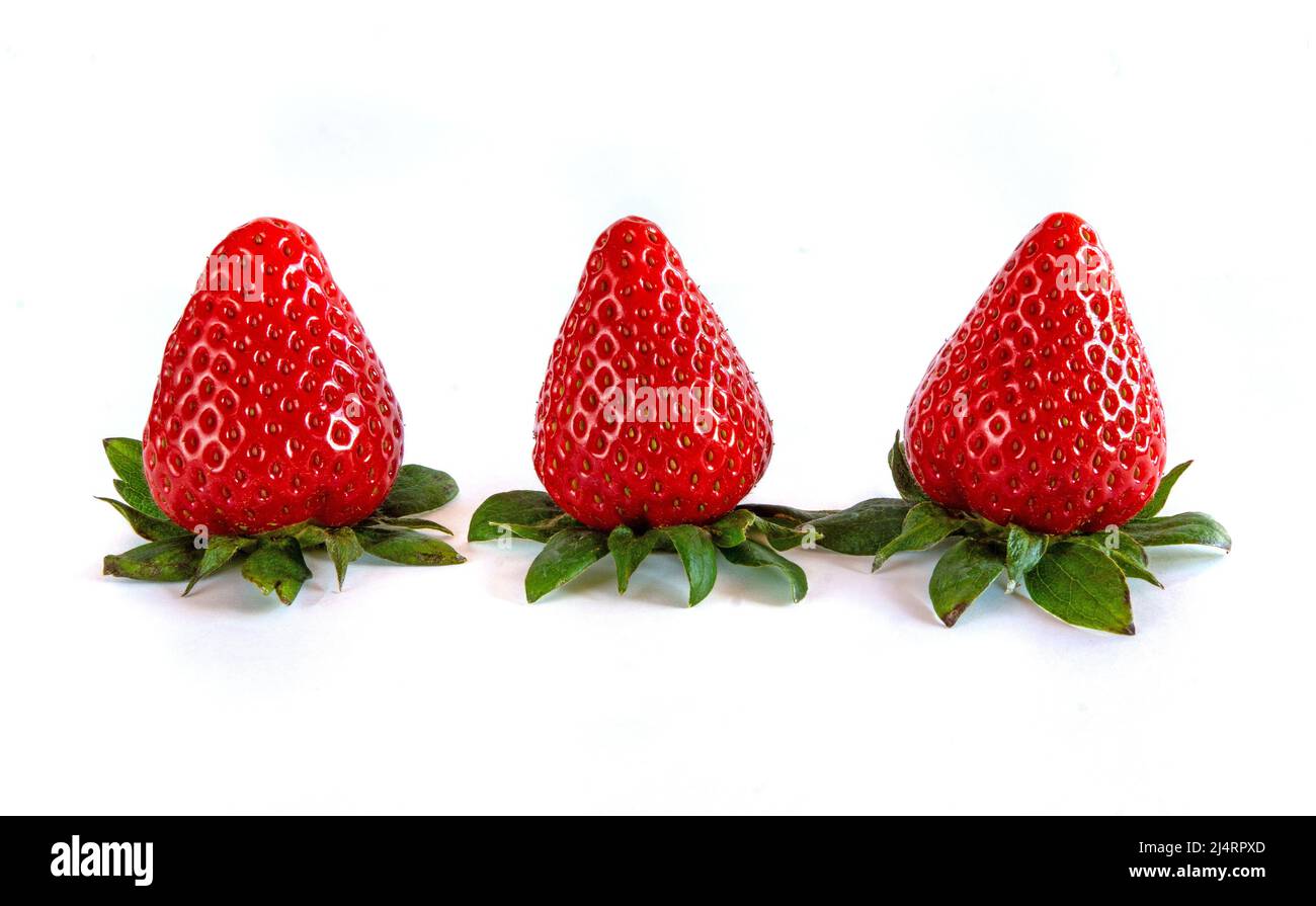 Fresh strawberries over white background Stock Photo