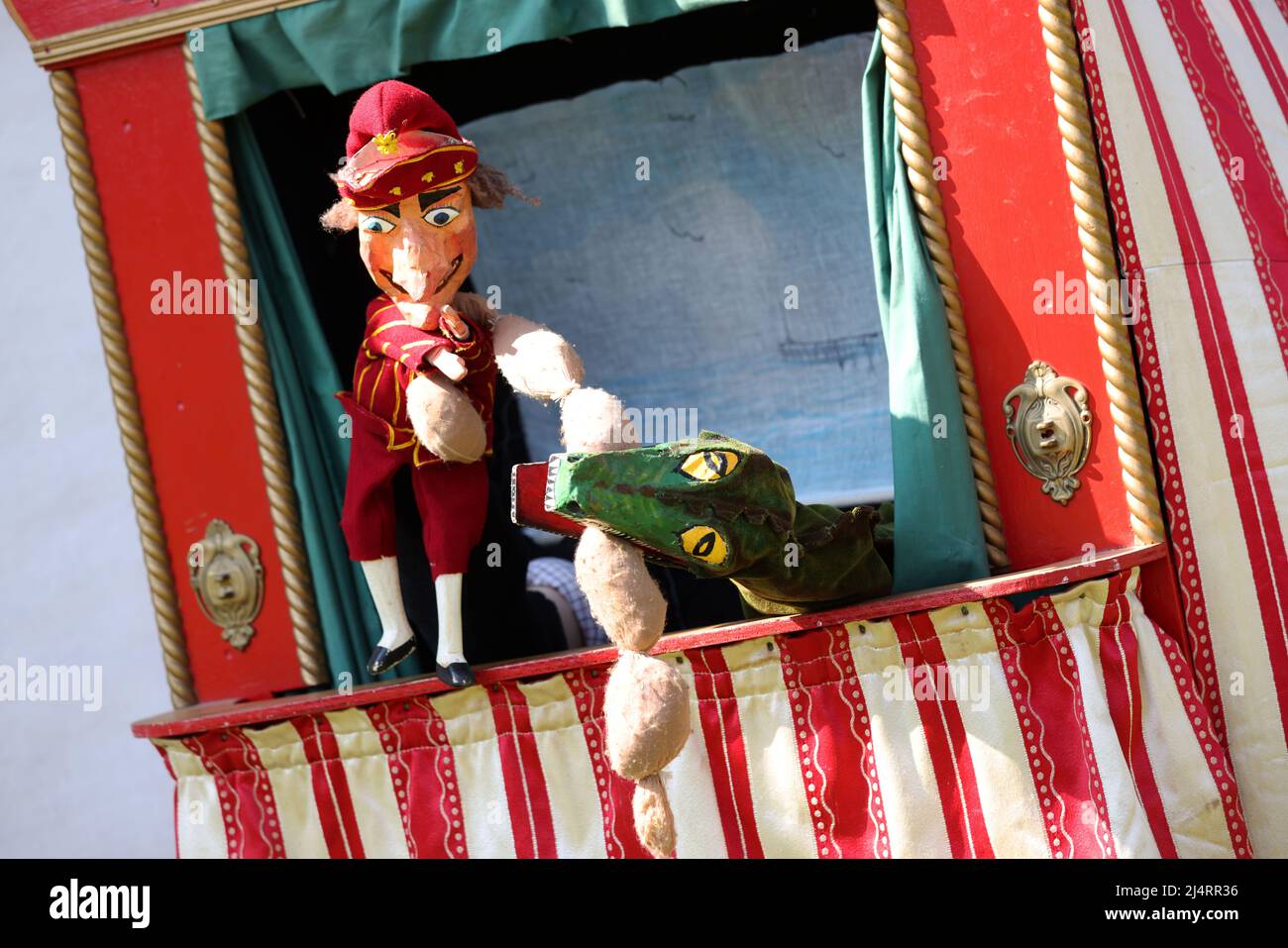 A Punch and Judy Show pictured taking place at the Weald & Downland Museum in Singleton, Chichester, West Sussex, UK. Stock Photo
