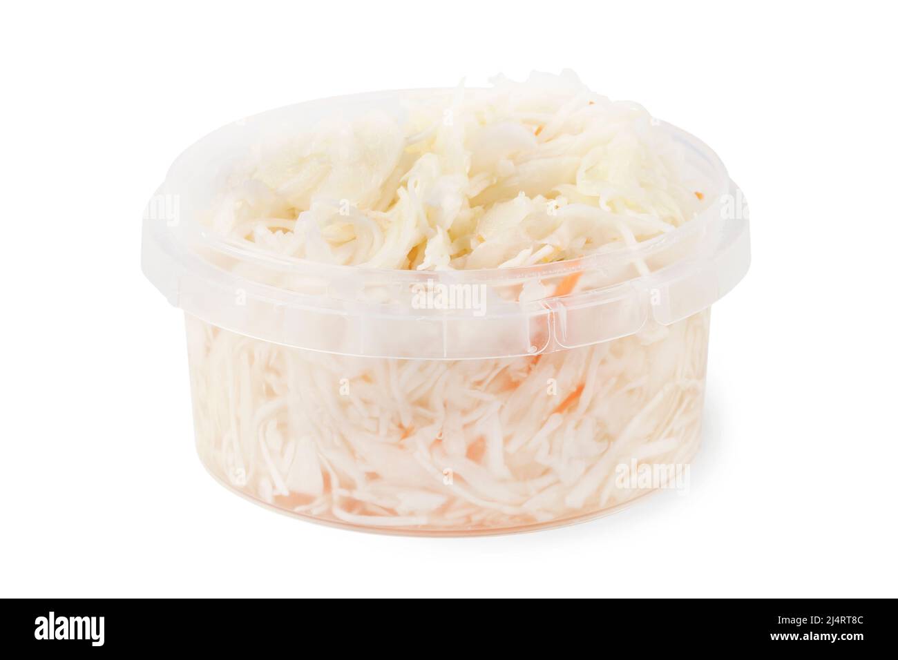 Sauerkraut with carrots in plastic container isolated on white Stock Photo