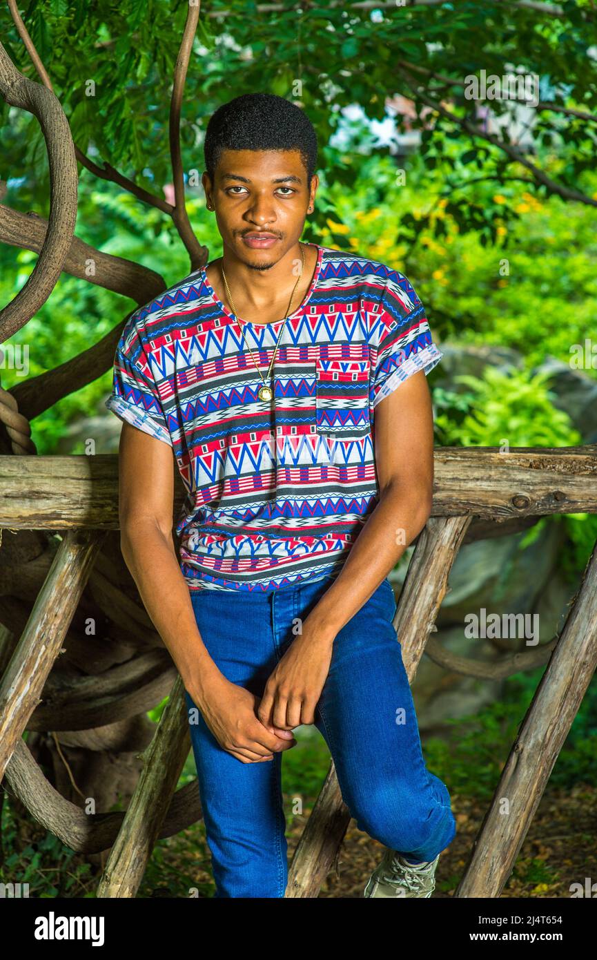 Black shirt and blue jeans hi-res stock 