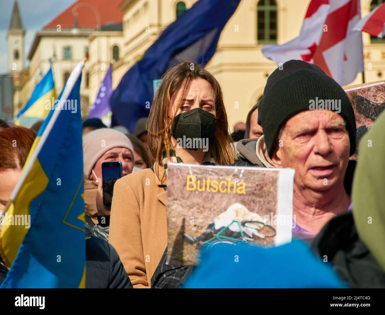 Demonstration Stop War in Ukraine. Banner Bucha Photo. Save Ukraine. No war, stop war, russian aggression. Munich - April, 2022 Stock Photo