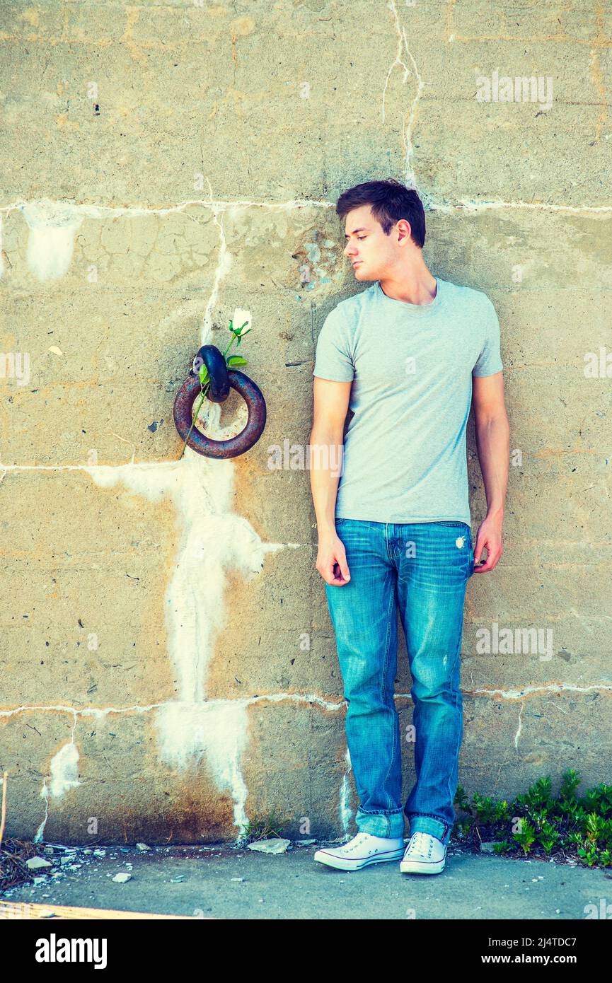 Man white t shirt and jeans profile hi-res stock photography and images -  Alamy