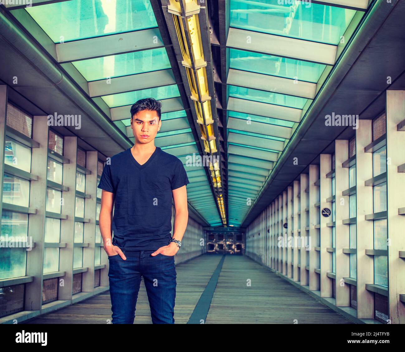Black shirt and blue jeans hi-res stock 