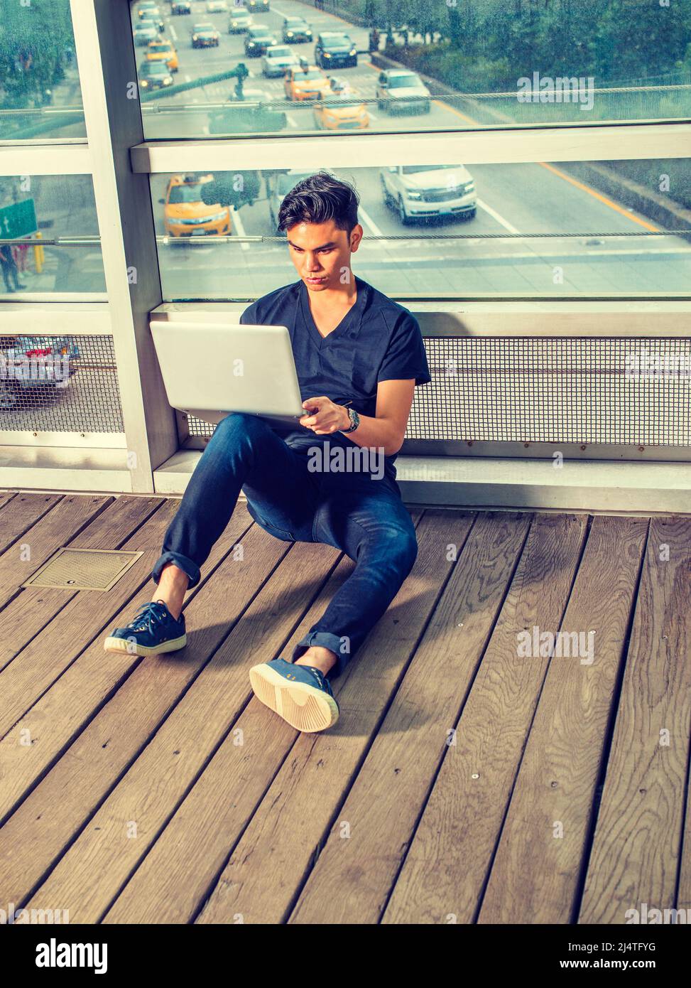 Black shirt and blue jeans hi-res stock photography and images - Alamy