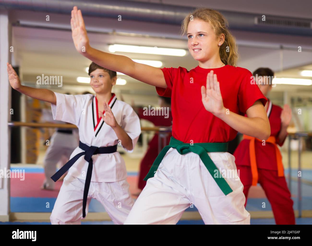 Girl and boy exercising mugendo movements Stock Photo Alamy