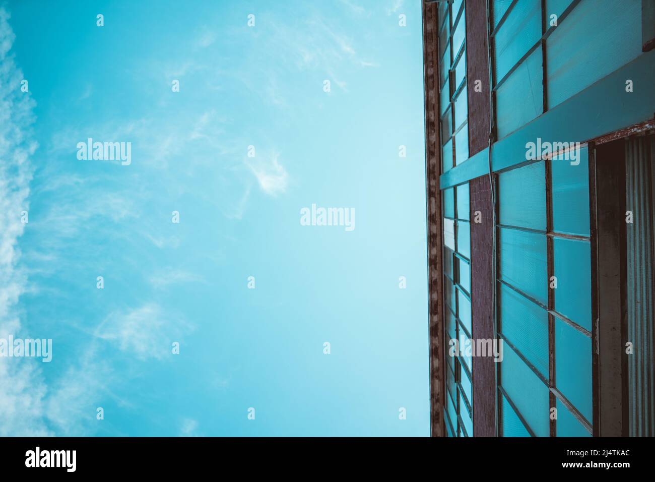 Old factory facade seen from below Stock Photo