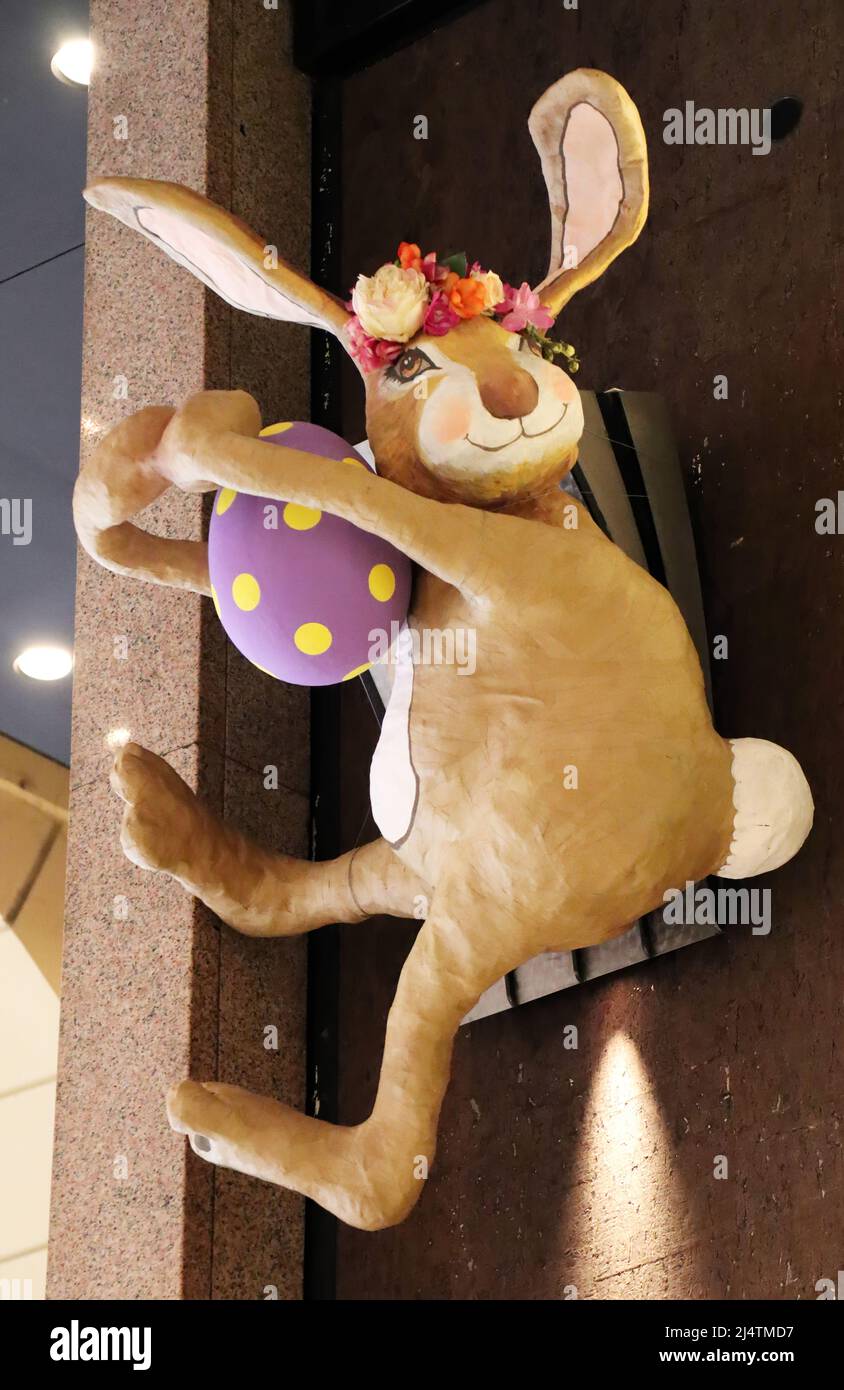 Rabbit decoration for Easter Holiday hanging on the wall. Easter Bunny. Bologna, Italy Stock Photo
