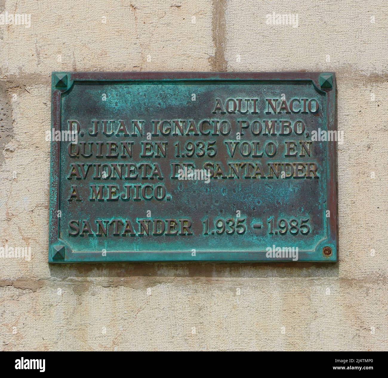 Brass plaque recording the birthplace of Juan Ignacio Pombo who flew a