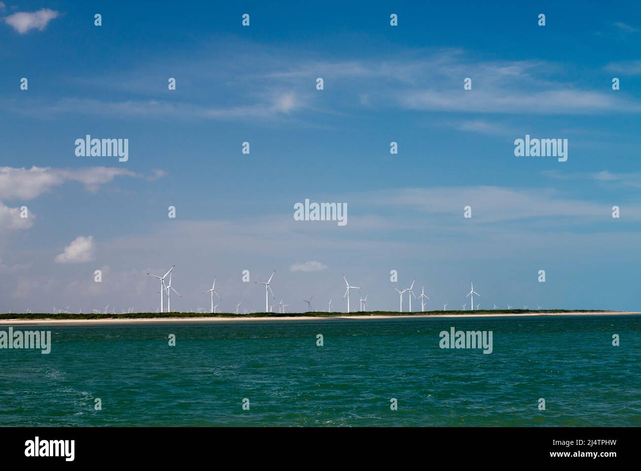 wind farm wind turbines seen from the sea on the coast of rio grande do norte, brazil Stock Photo
