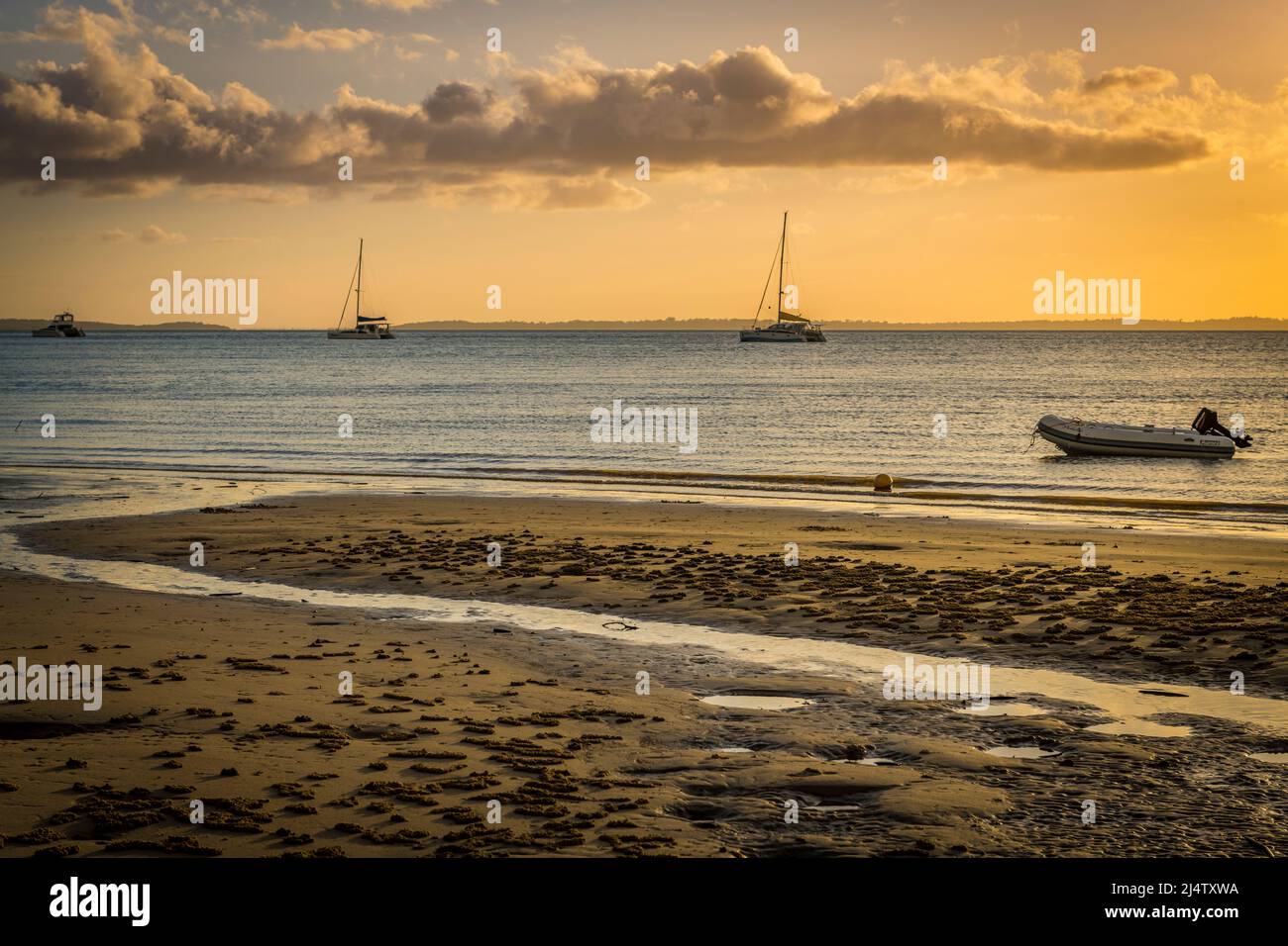 Boats at sunset at Kingfisher Bay, Fraser Island. Queensland, Australia. Stock Photo
