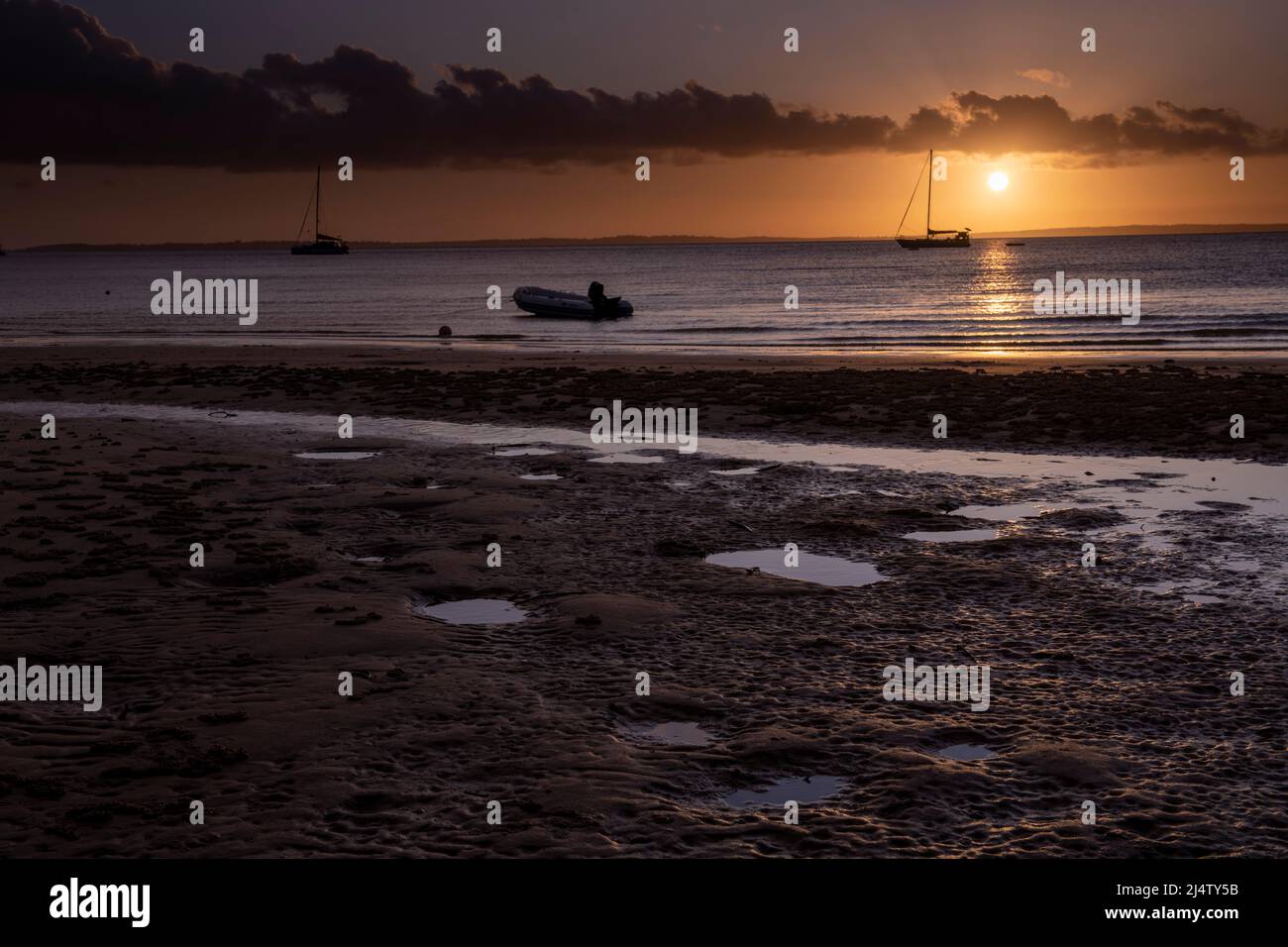 Boats at sunset at Kingfisher Bay, Fraser Island. Queensland, Australia. Stock Photo