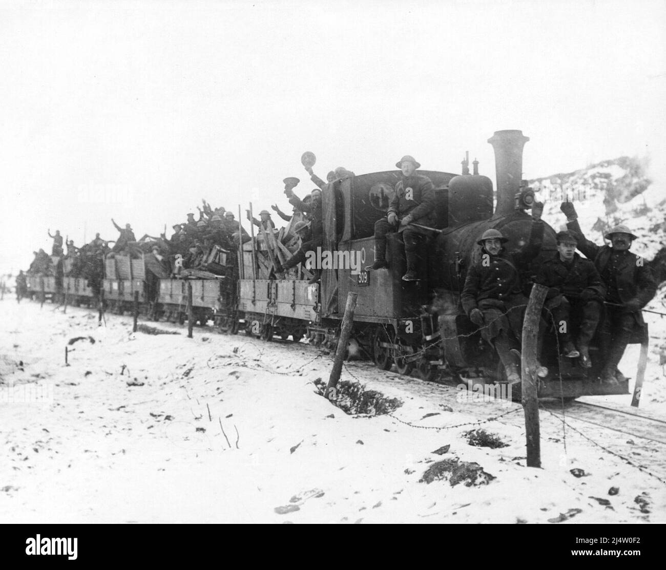 A working party of British troops going up to the forward area by light railway, Elverdinghe, near Ypres, February 1917. Stock Photo