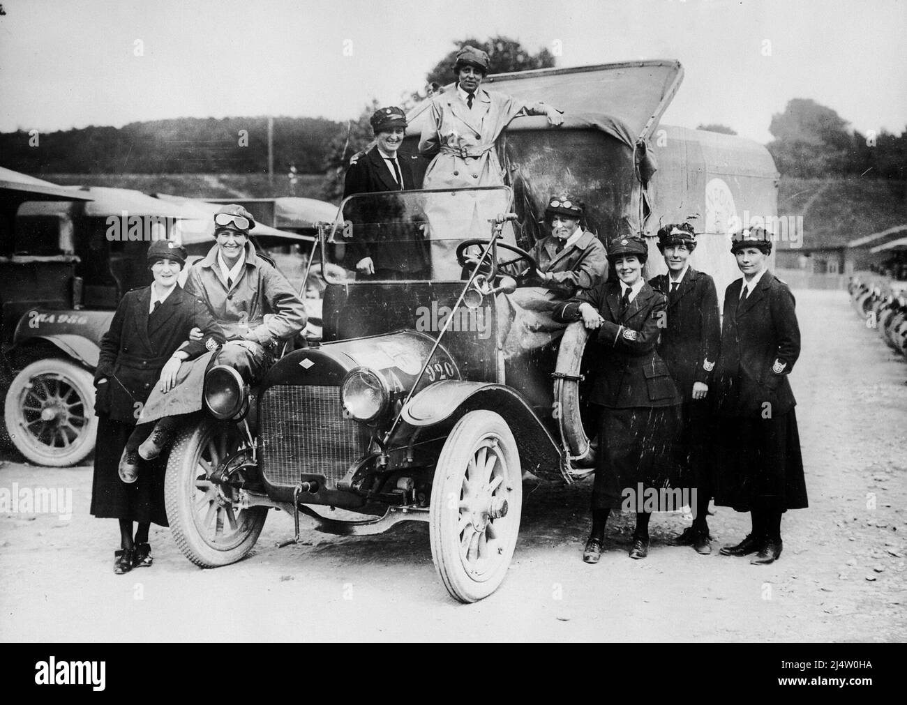 Female ambulance staff from the VAD (Voluntary Aid Detachment) pose for the camera with their ambulance, France, during World War I. Stock Photo