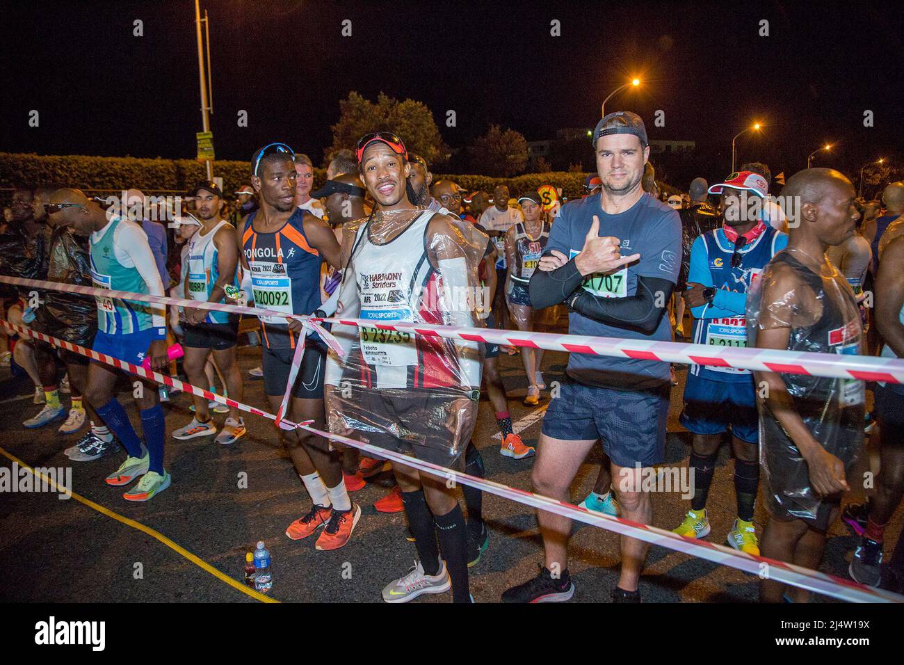 Cape Town, South Africa. 17th Apr, 2022. Runners wait to start the ultra marathon of Two Oceans Marathon in Cape Town, South Africa, on April 17, 2022. The two-day Two Oceans Marathon took place after a two-year hiatus due to COVID-19 pandemic. Credit: Francisco Scarbar/Xinhua/Alamy Live News Stock Photo