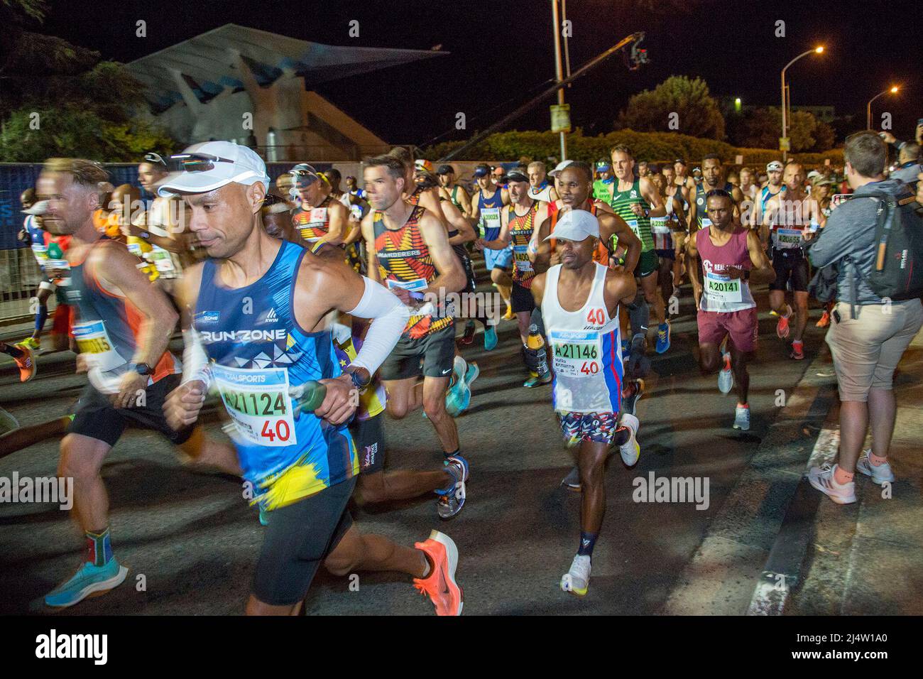 Cape Town, South Africa. 17th Apr, 2022. Runners compete during the ultra marathon of Two Oceans Marathon in Cape Town, South Africa, on April 17, 2022. The two-day Two Oceans Marathon took place after a two-year hiatus due to COVID-19 pandemic. Credit: Francisco Scarbar/Xinhua/Alamy Live News Stock Photo