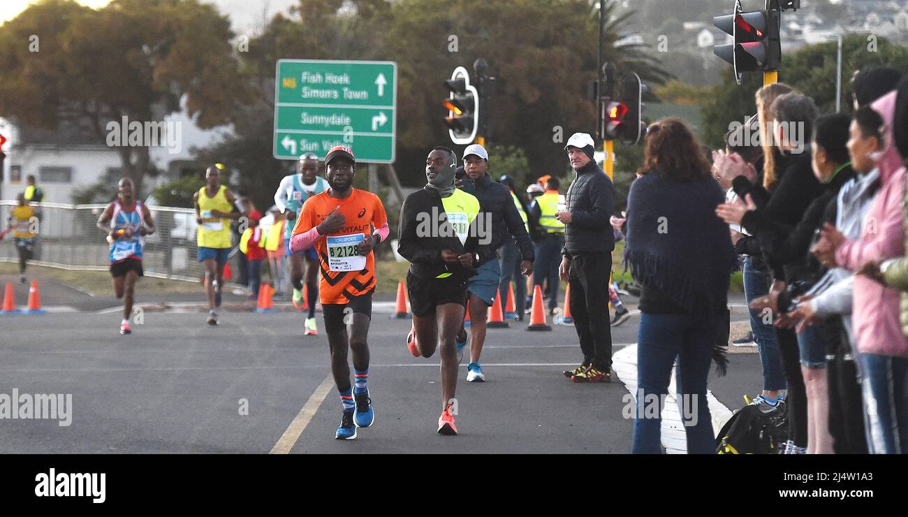Cape Town, South Africa. 17th Apr, 2022. Runners compete during the ultra marathon of Two Oceans Marathon in Cape Town, South Africa, on April 17, 2022. The two-day Two Oceans Marathon took place after a two-year hiatus due to COVID-19 pandemic. Credit: Xabiso Mkhabela/Xinhua/Alamy Live News Stock Photo