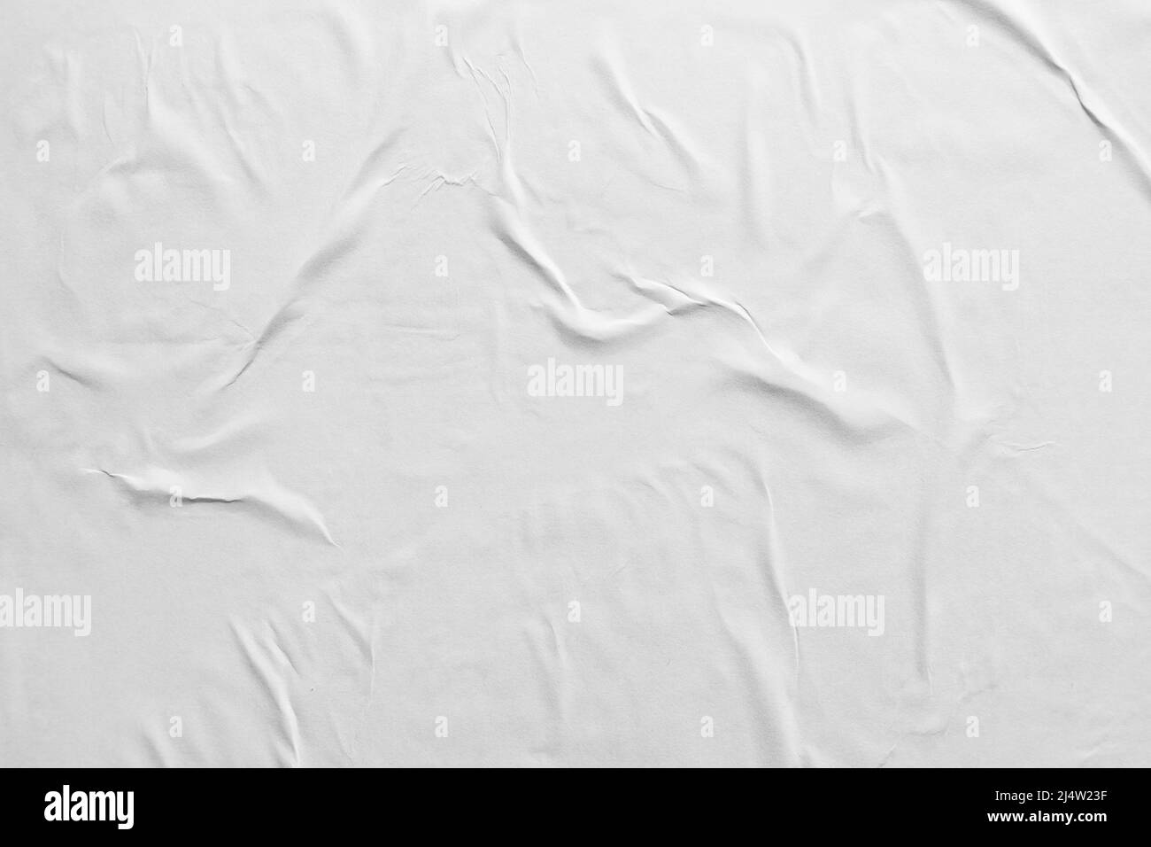 Wrinkled white poster paper texture background Stock Photo