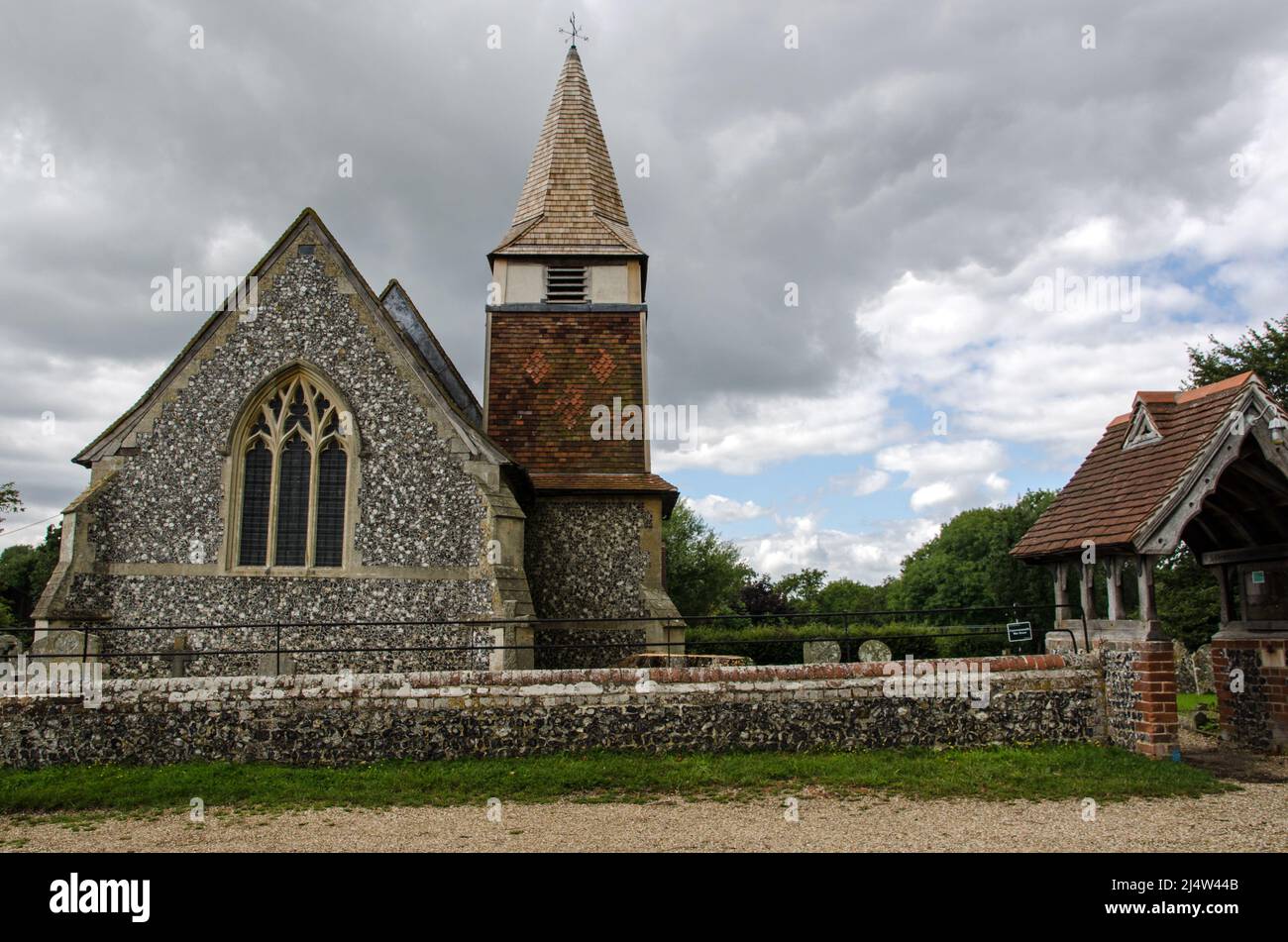 View of the historic church of Saint Mary in the Hampshire village of Hartley Wespall on a summer afternoon. Stock Photo