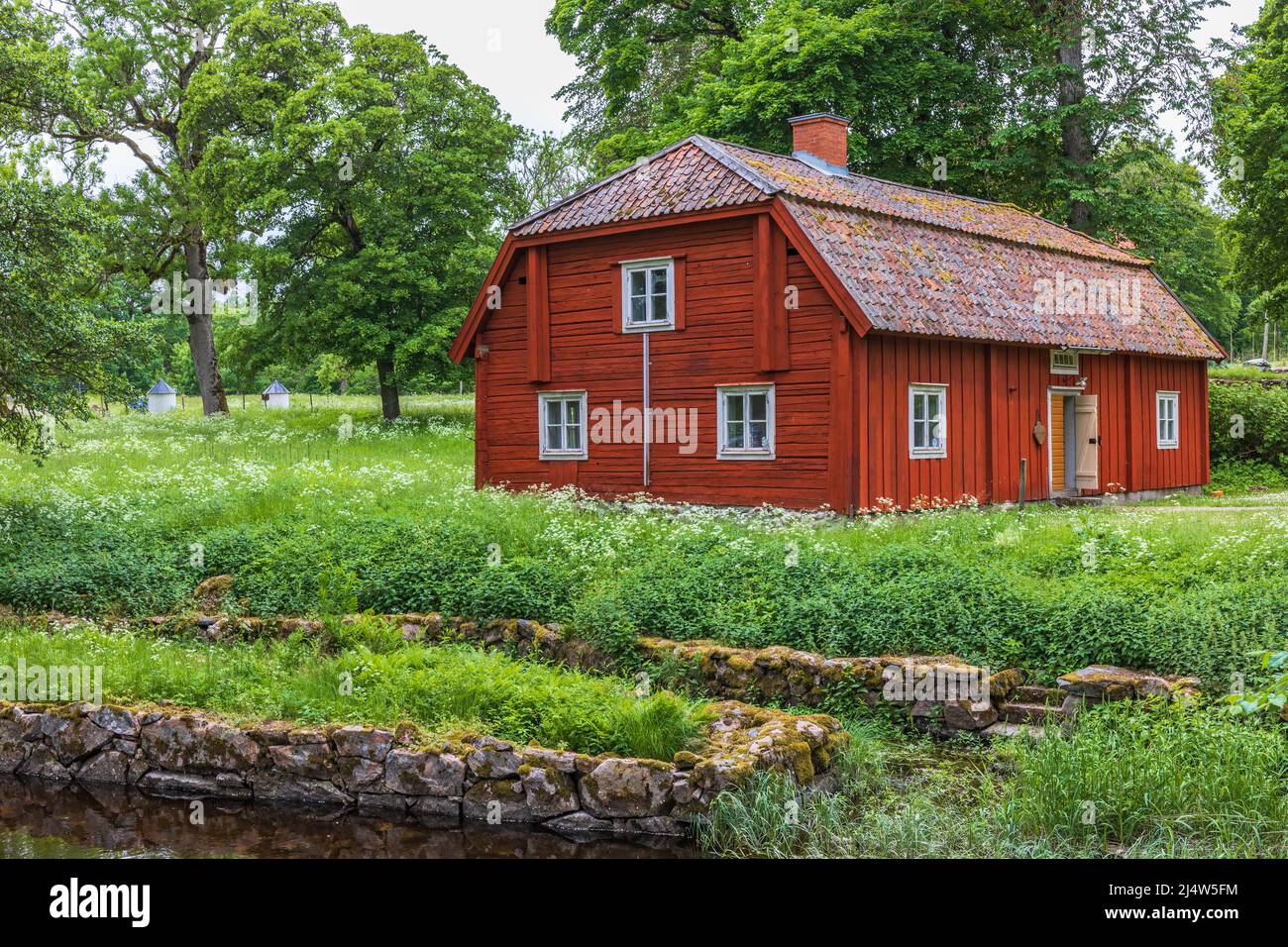 Old red timber house in the countryside Stock Photo Alamy