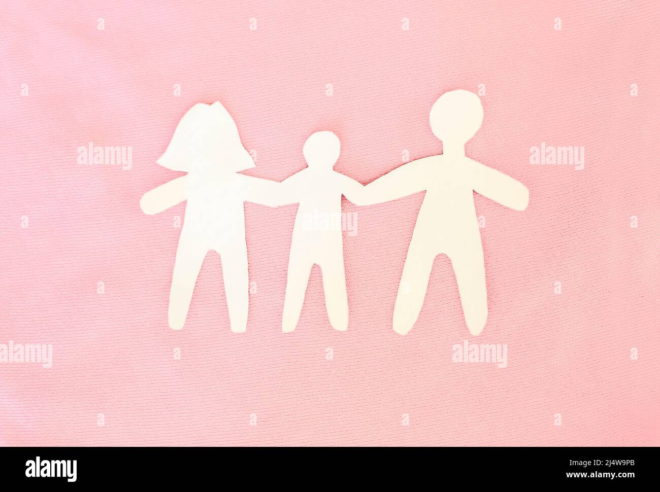 Stick figure family paper doll chain. Clipart image isolated on pink  background. love and care concept Stock Photo - Alamy, image size:1300x970