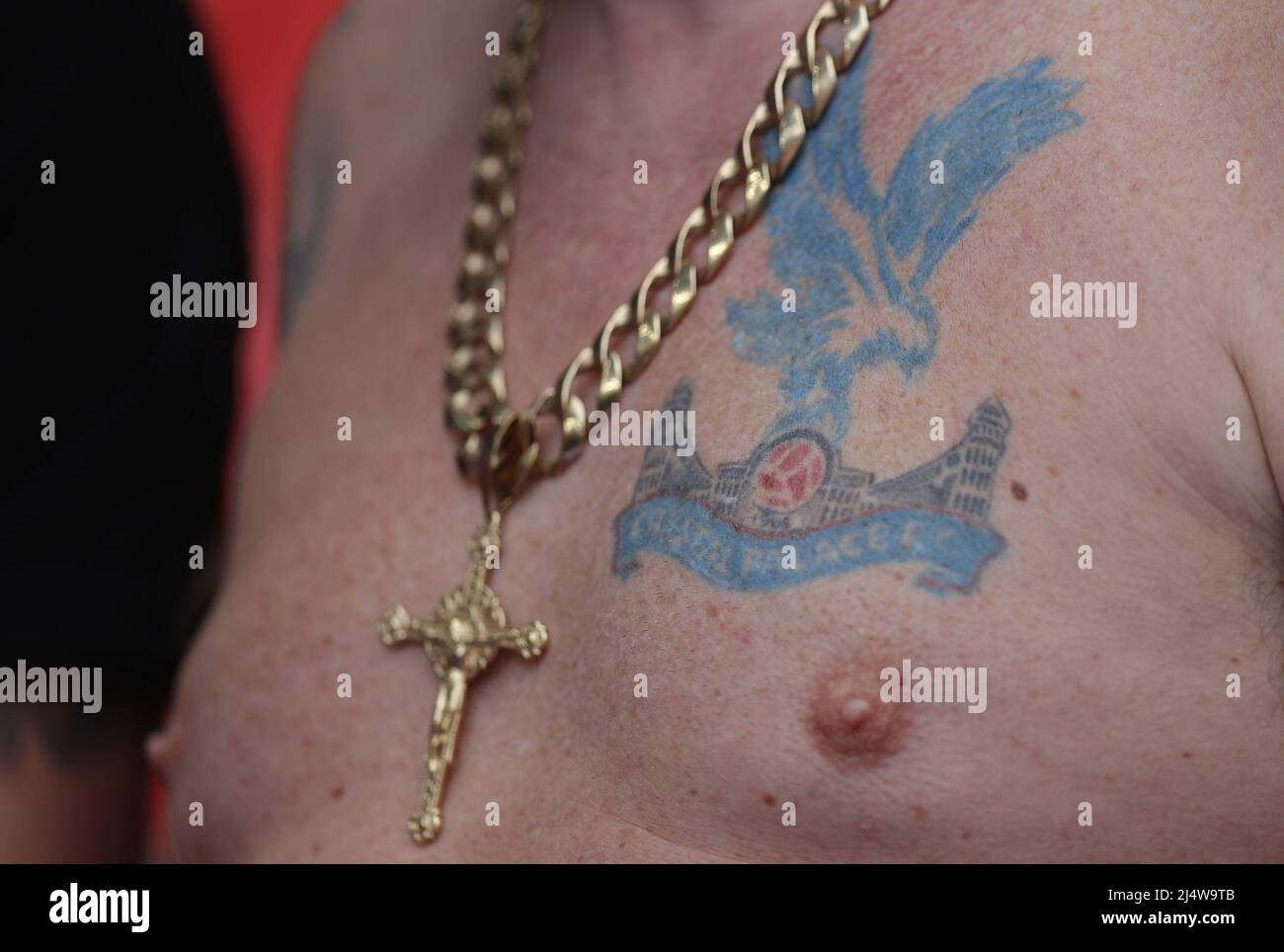 London, UK. 17th Apr, 2022. A Crystal Place fan wears a tattoo of the club crest on his chest during the Emirates FA Cup match at Wembley Stadium, London. Picture credit should read: Paul Terry/Sportimage Credit: Sportimage/Alamy Live News Stock Photo