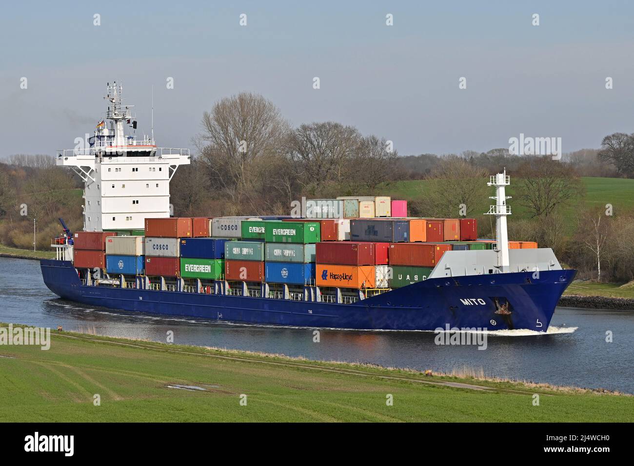 Containership MITO passing the Kiel Canal Stock Photo