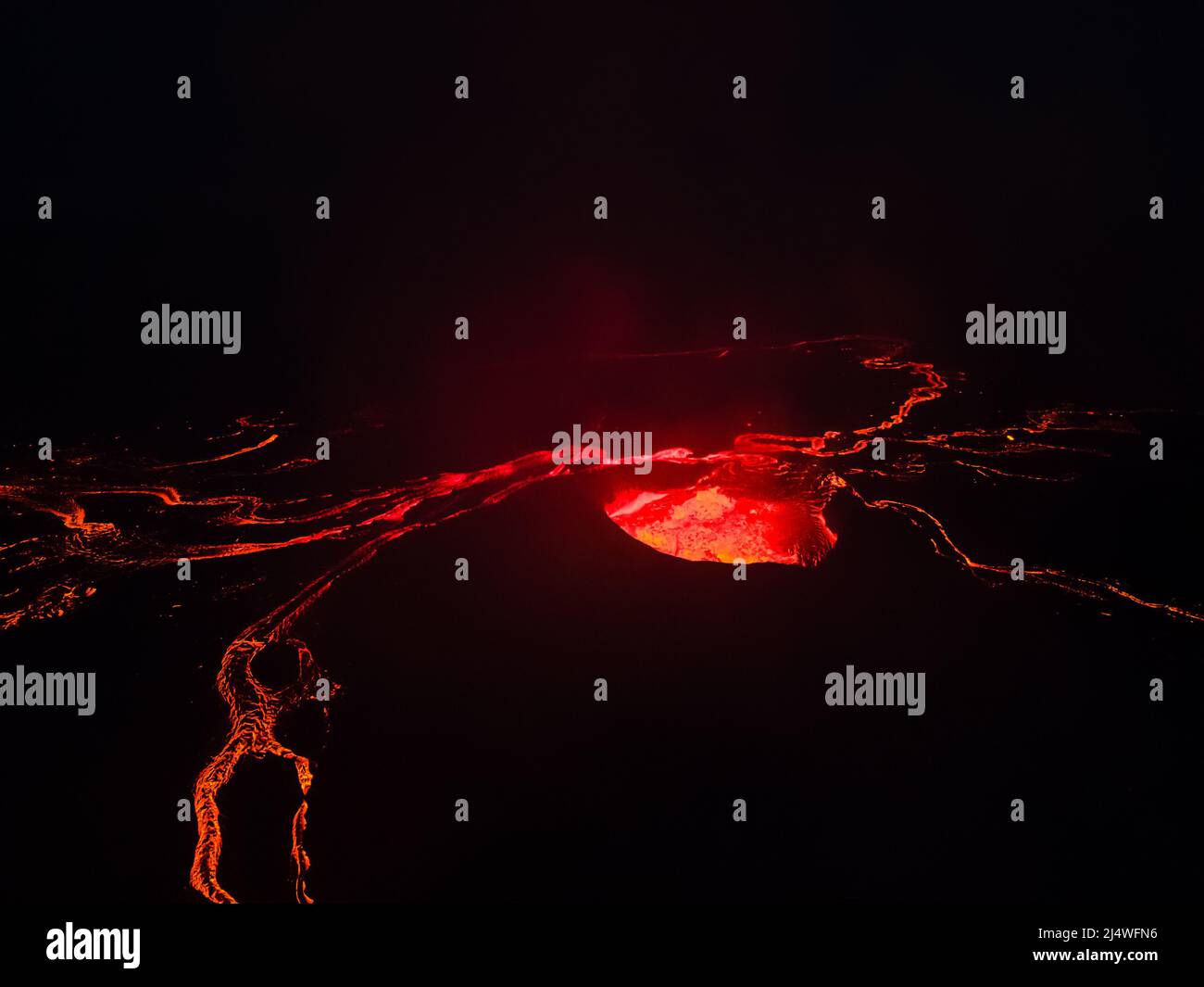 Impressive aerial view of the exploding red lava from the Active Volcano in Iceland Stock Photo