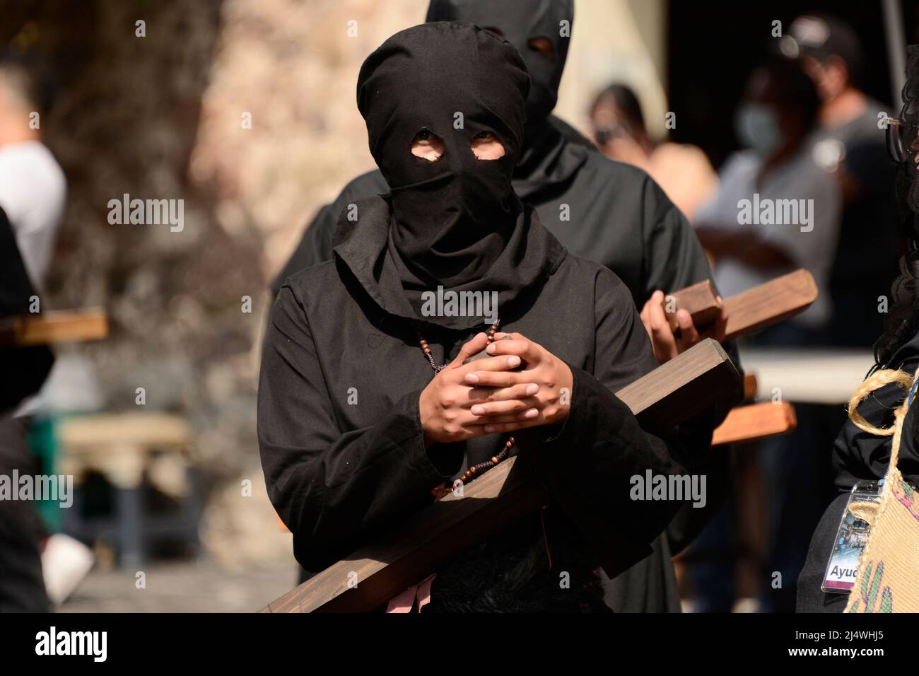 Non Exclusive: TAXCO, MEXICO - APR 15, 2022: A woman penitent wears a ...