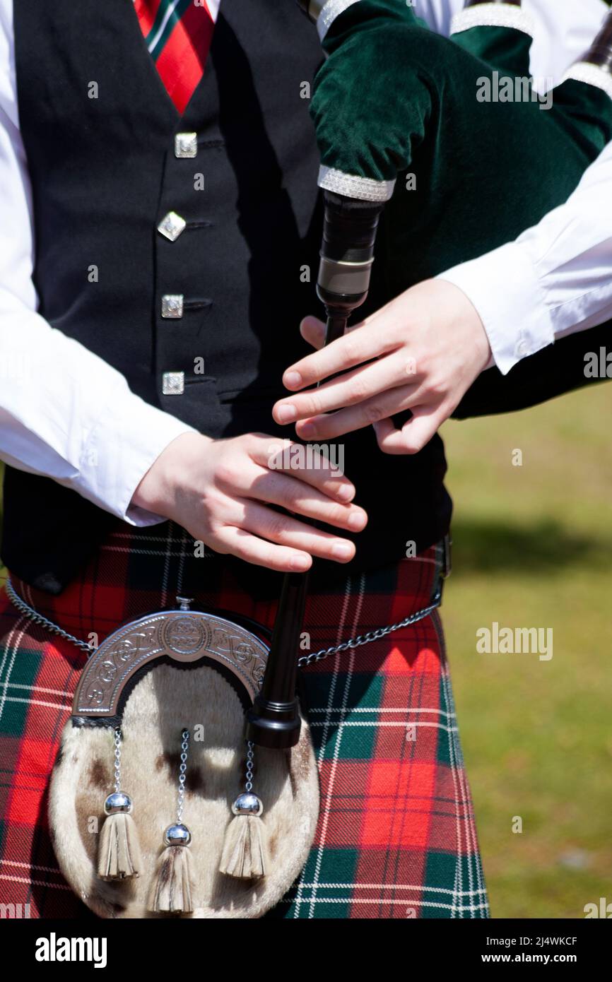 Piper playing bagpipes in Pipe Band, Helensburgh, Scotland Stock Photo