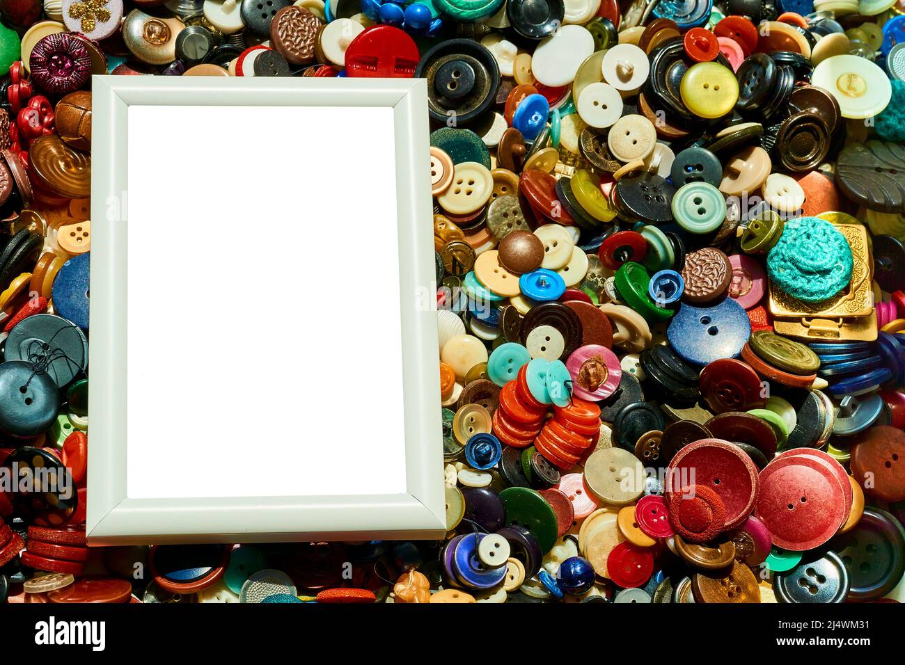 Blank frame and place for text on tailor buttons background Stock Photo
