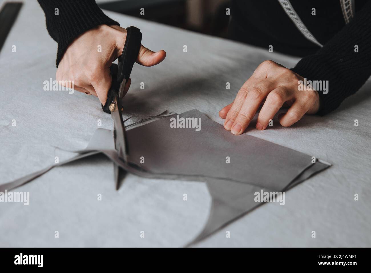 Woman With Tailor Scissors Cutting Out Fabric 39, People Stock