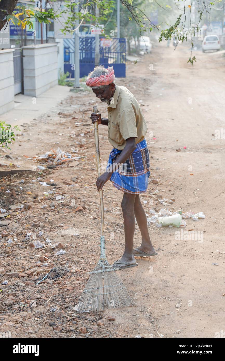 Indian road sweeper hires stock photography and images Alamy