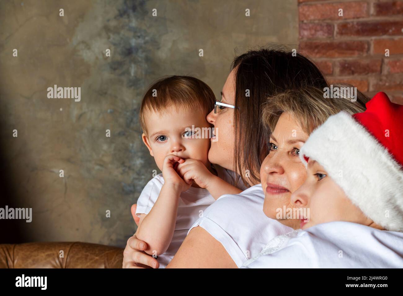 Happy family portraits. Diverse people. Multigenerational embrace. Stock Photo