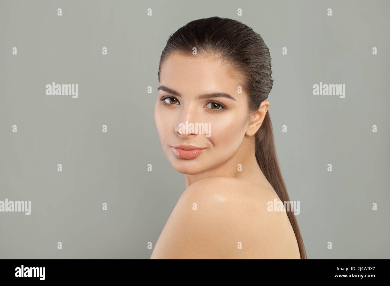 Portrait of charming woman with perfect skin after peeling, lotion, mask. Perfection, wellness, wellbeing, hydration concept Stock Photo