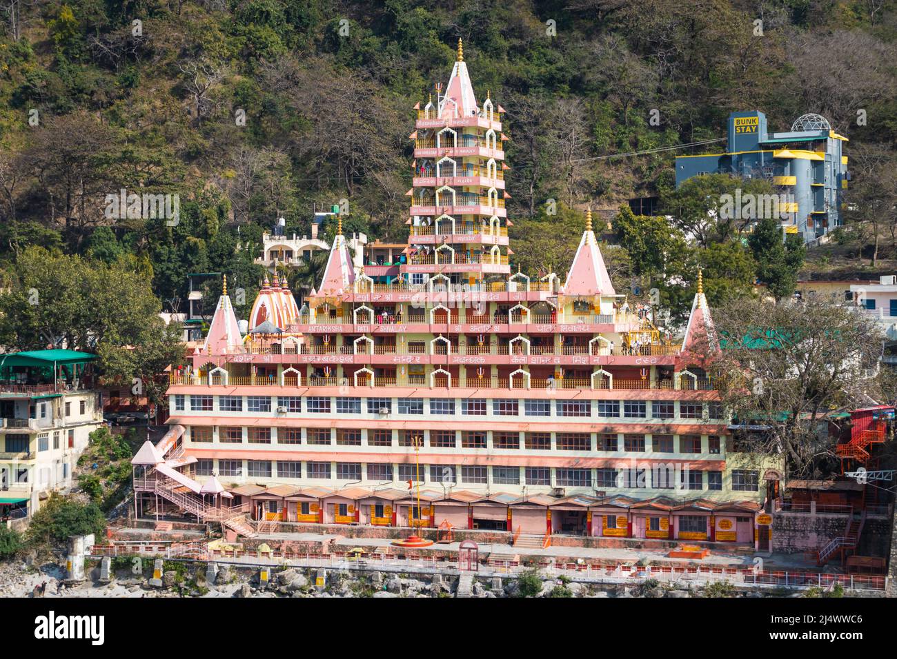 ancient hindu temple multistory at day from flat angle image is taken at trimbakeshwar temple lakshman jhula rishikesh uttrakhand india on Mar 15 2022 Stock Photo