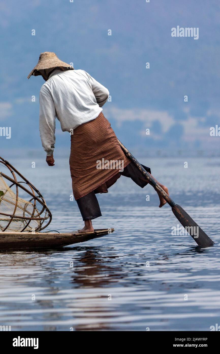 A leg rowing fisherman on Inle Lake in Shan State in Myanmar (Burma