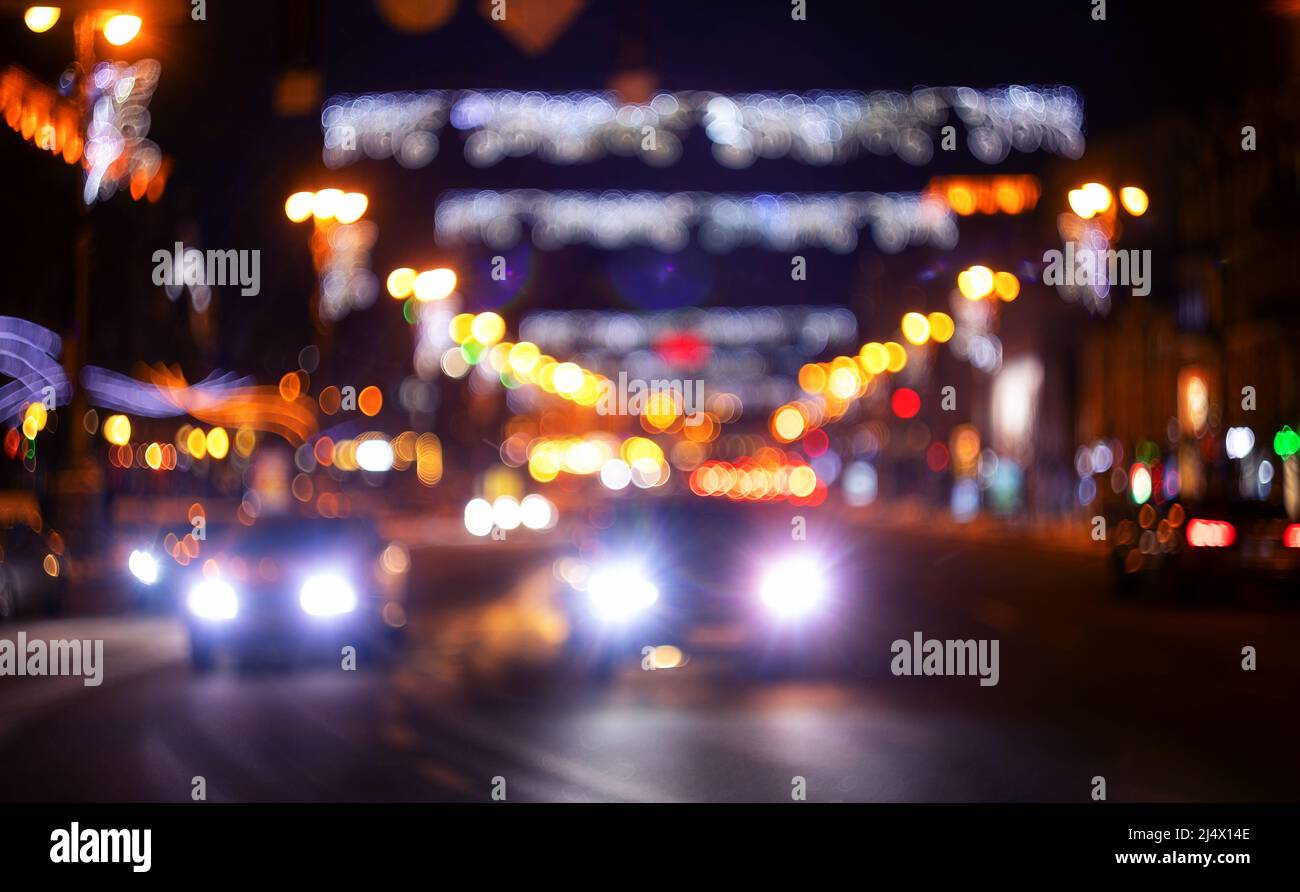 Defocused image, night city street. Blurred lights and houses Stock ...