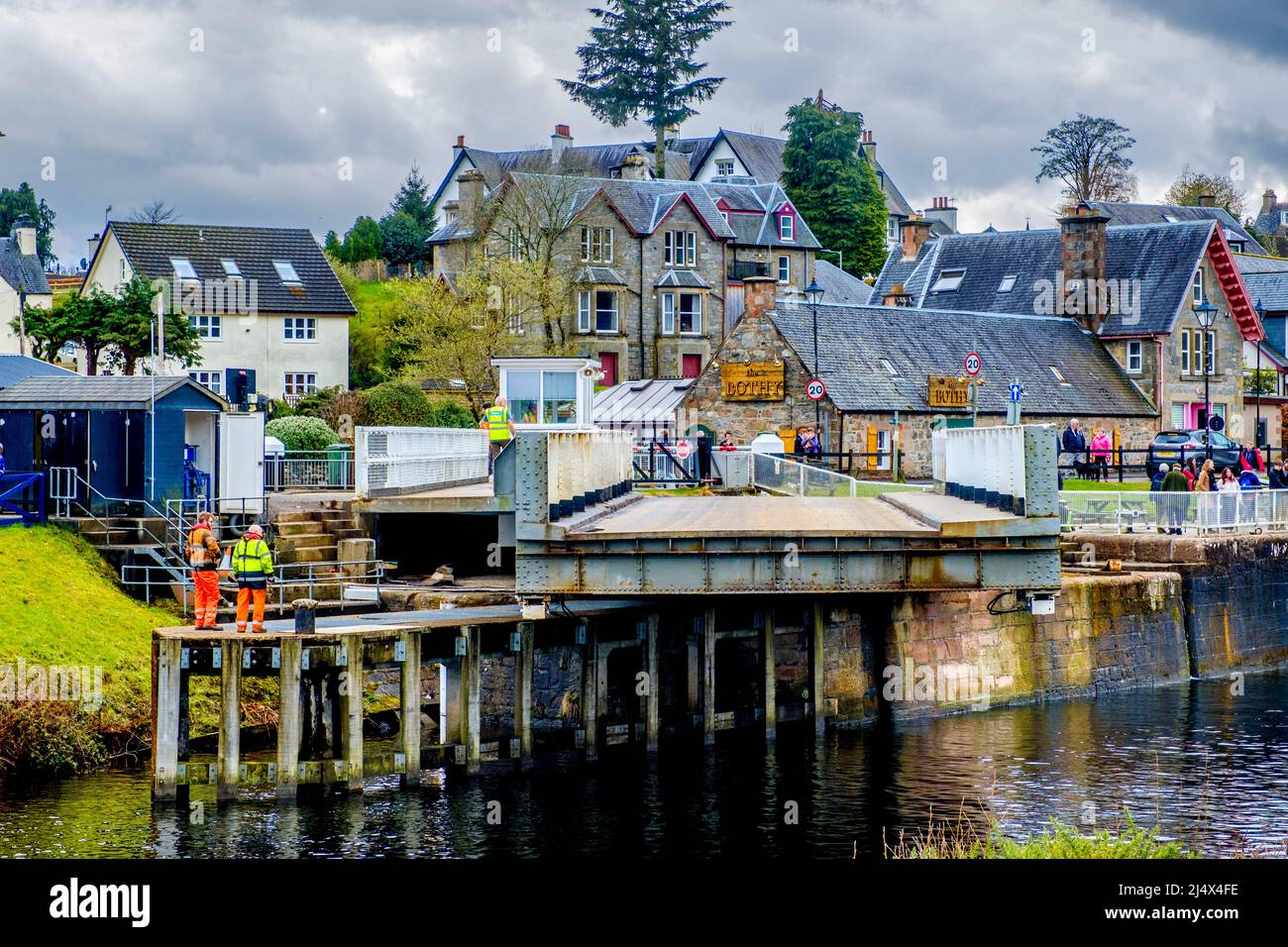The swing bridge opening over the Caledonian Canal at Fort Augustus Stock Photo