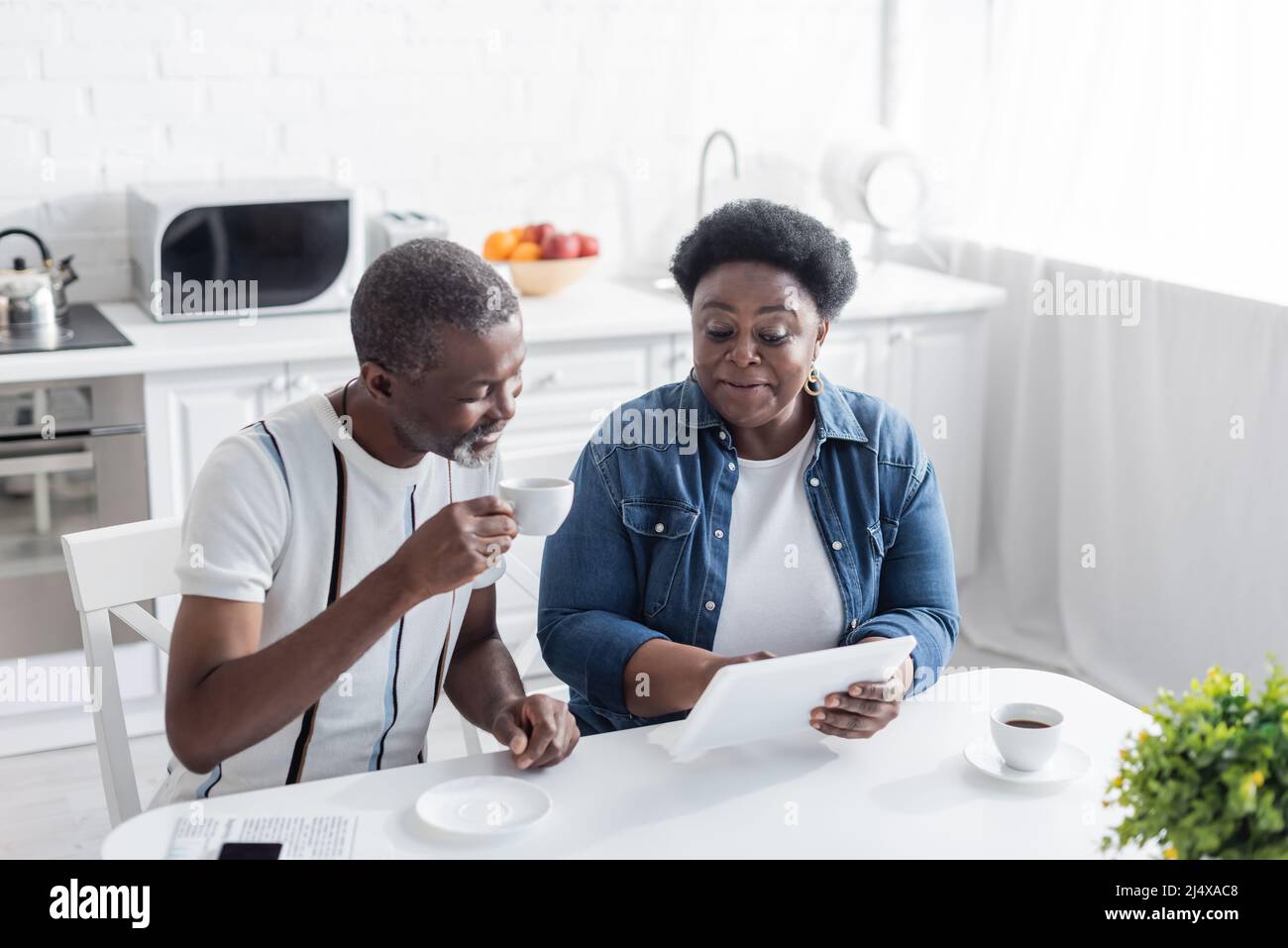 African american senior woman cup hi-res stock photography and images ...
