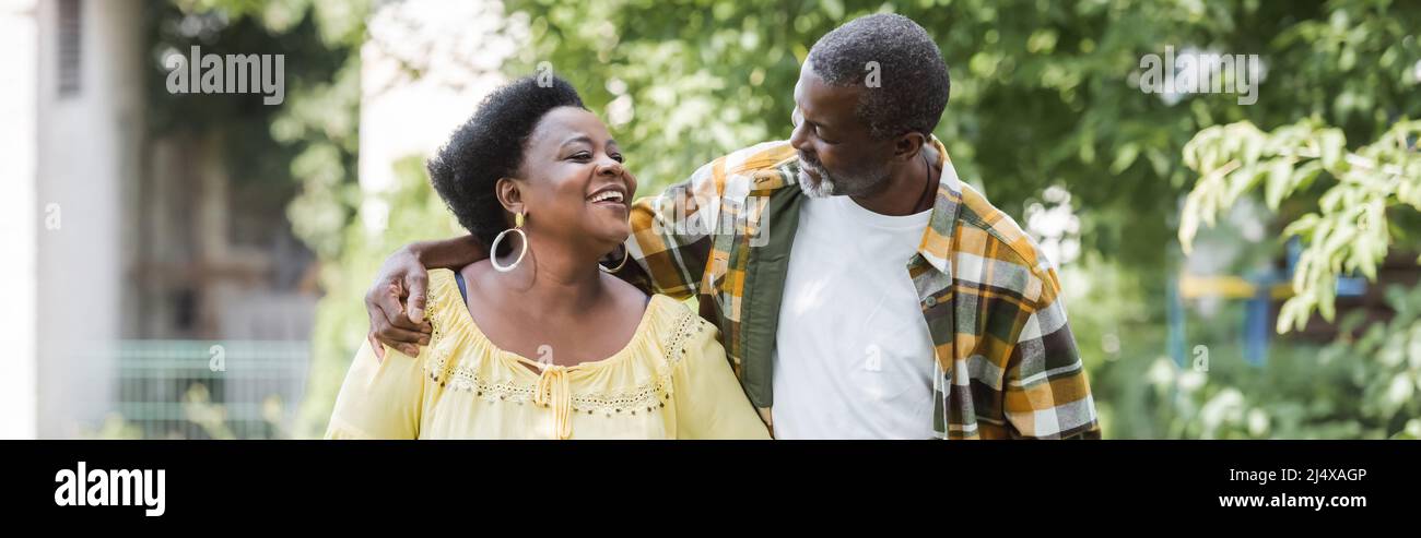 happy senior african american couple walking in park, banner Stock ...