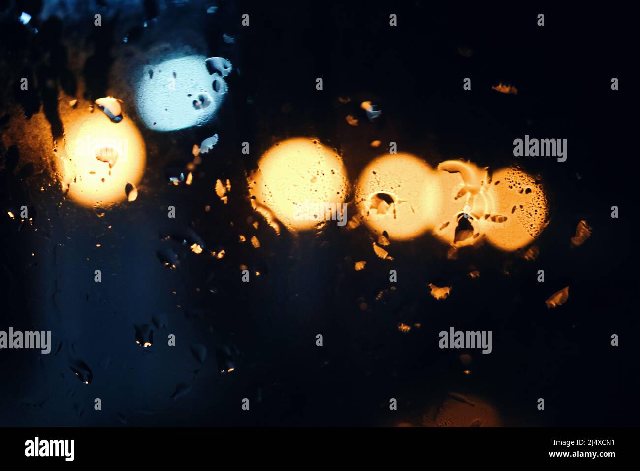 Orange bokeh lights on dark background hi-res stock photography and ...