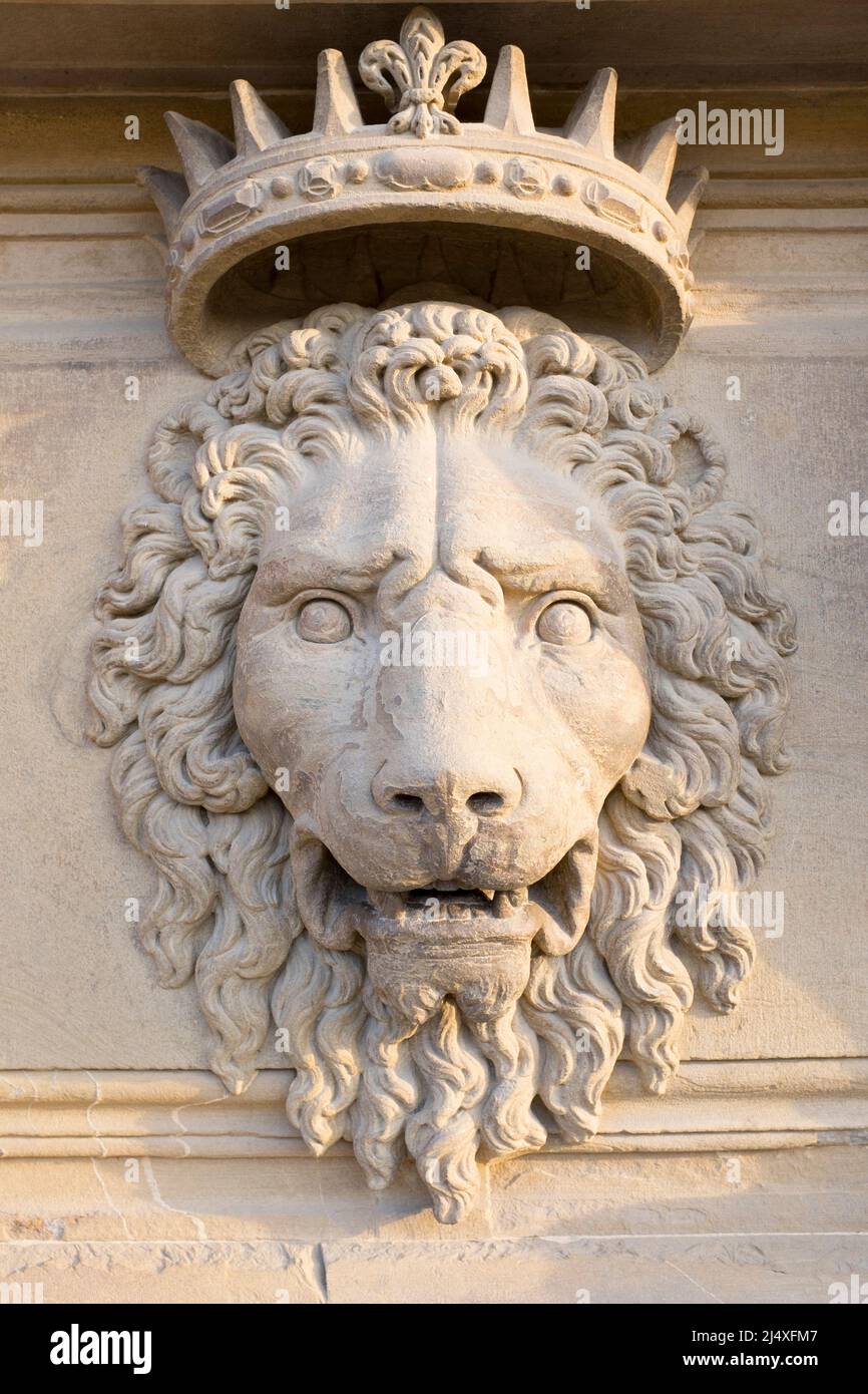 Carved Lion Heads with Crowns on the exterior facade of the  Palazzo Pitti Florence Italy Stock Photo