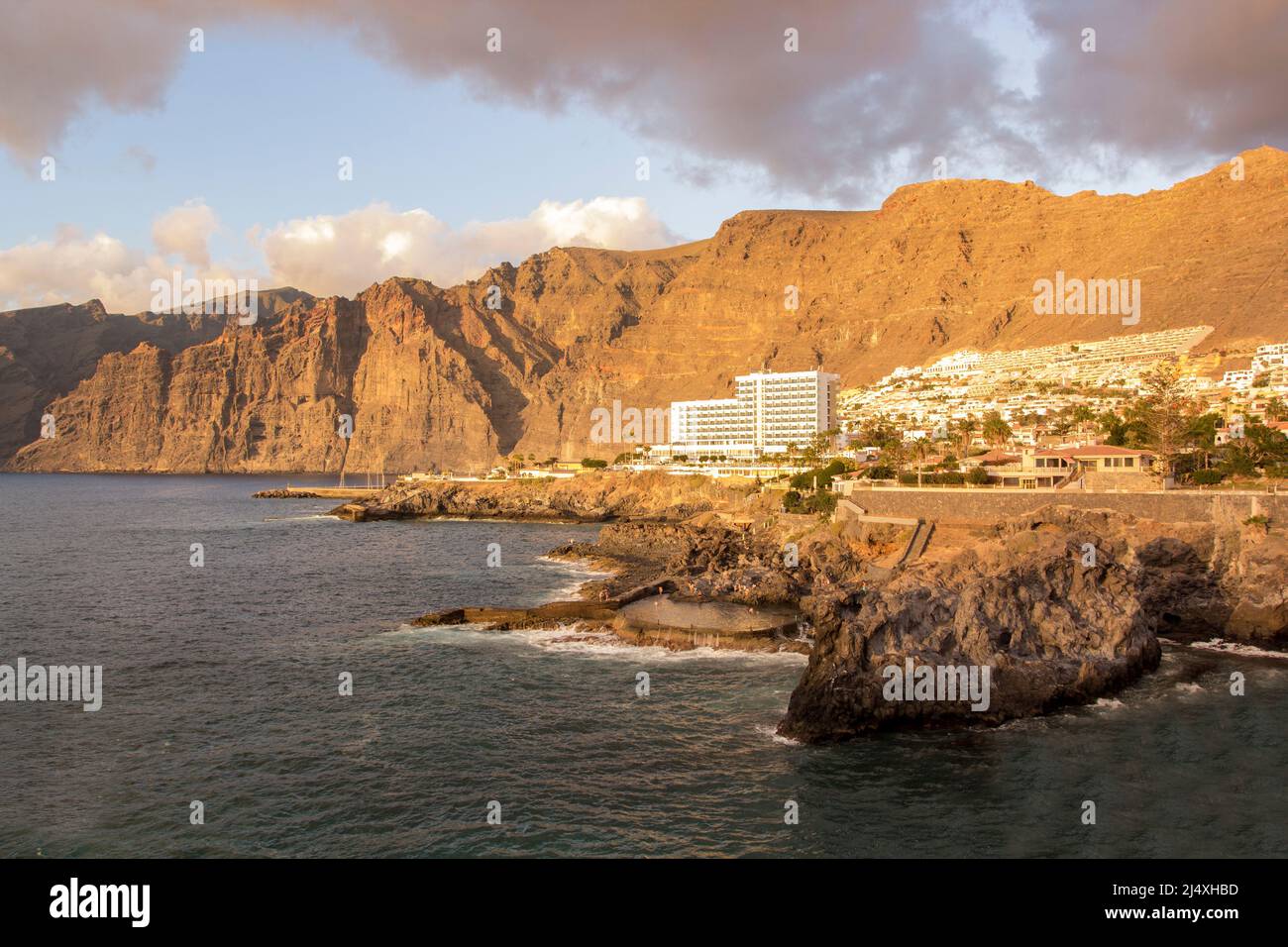 The view of famous cliffs and natural, rock pool in Los Gigantes. Tenerife, Canary Islands, Spain. Stock Photo